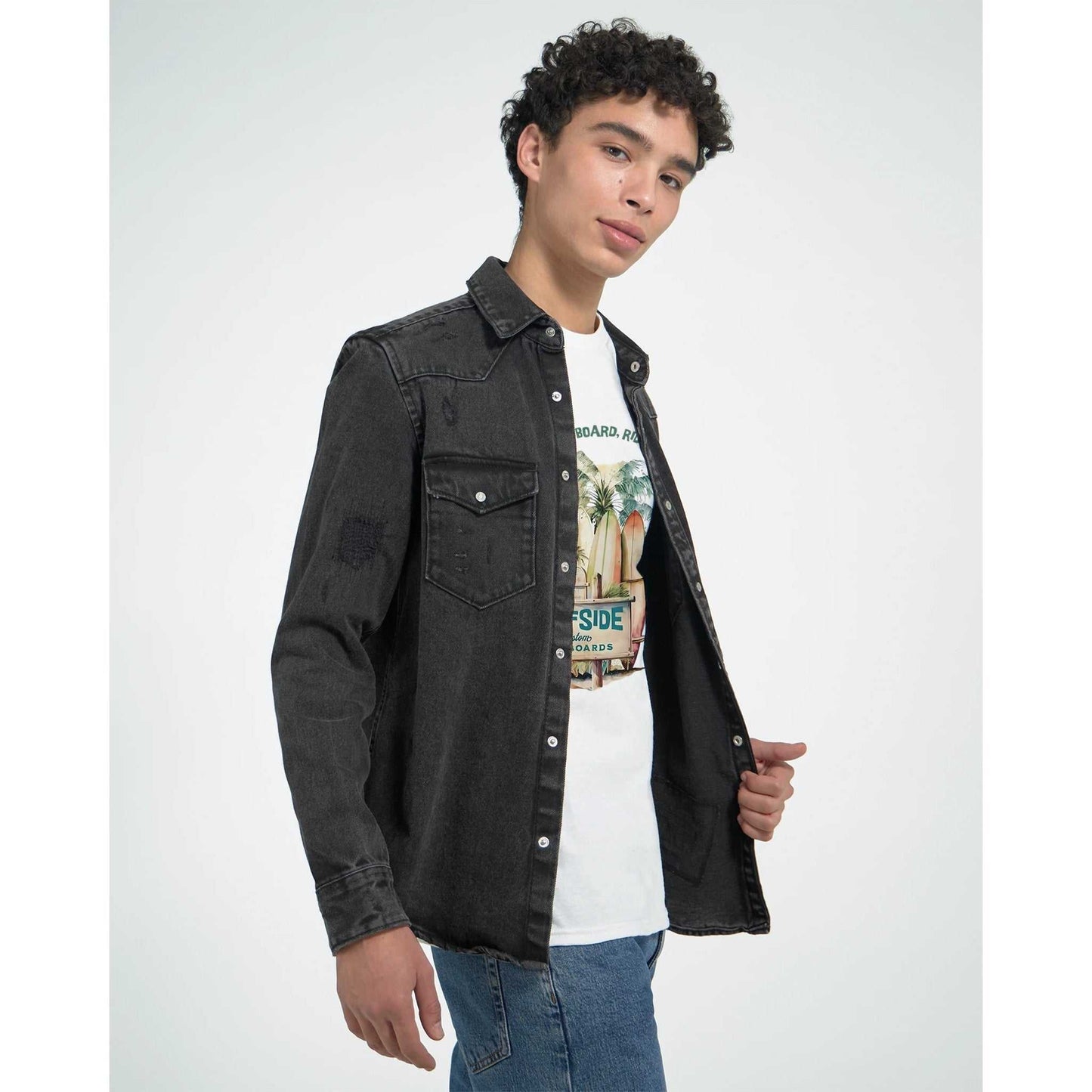 young man wearing sommer surfside t-shirt with relaxed fit and classic summer surf design under a black denim jacket