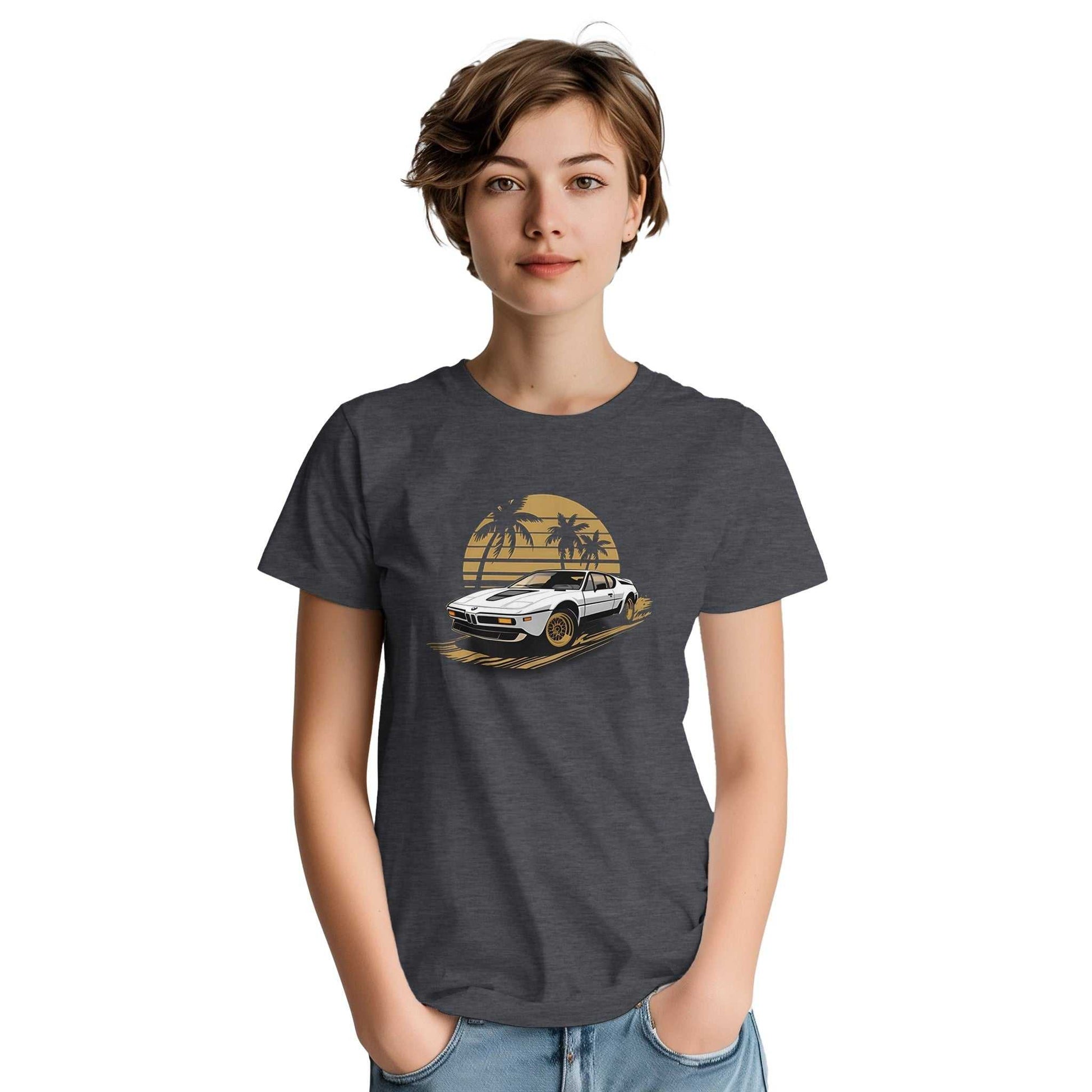 Young person wearing premium unisex summer car t-shirt with vintage car and palm tree graphic on charcoal fabric