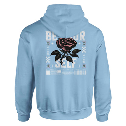 Light blue unisex hoodie with "Be Yourself" text and rose graphic on the back, made of soft cotton-polyester blend with double-lined hood and front pouch pocket.