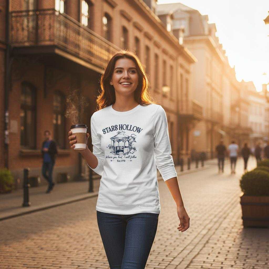frau trägt weißes gilmore girls langarm-t-shirt aus 100% baumwolle mit stars hollow print beim spaziergang