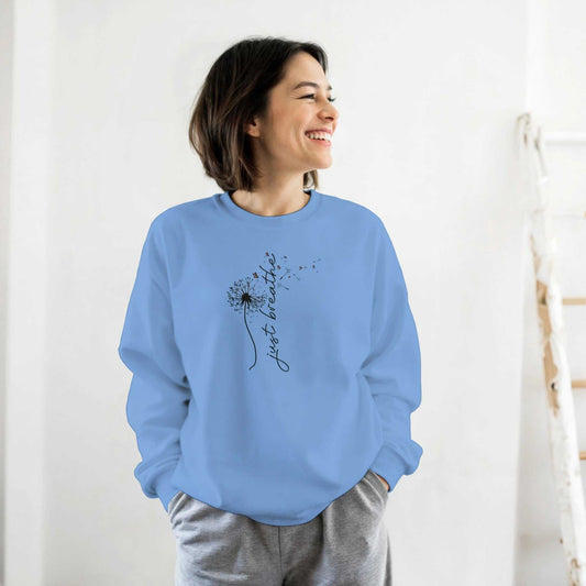 Kuschelpullover für Damen in Hellblau mit Dandelion-Print und entspannter Passform