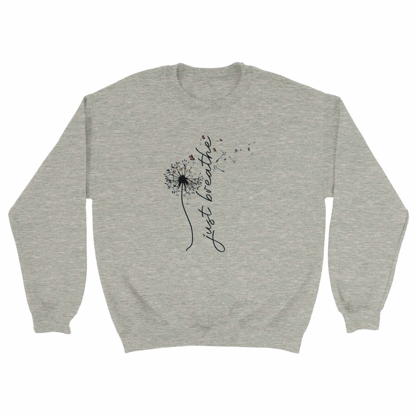 kuscheliger entspannungspullover in grau mit dandelion-design und schriftzug "just breathe"